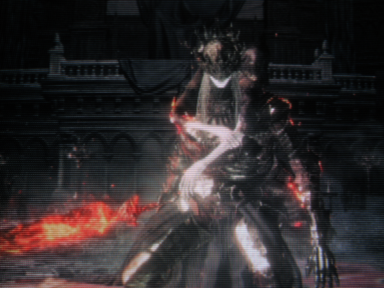 Lothric, Younger Prince of Lothric, rejected his duty as Lord of Cinder, dooming the world. From the highest point in his ruined kingdom he looks out at the eclipse consuming his realm and grins wryly, satisfied.