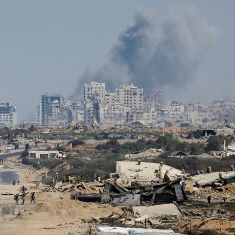 Smoke billowed in Gaza City during Israeli military operation on Monday.
