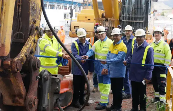 Pramod Agrawal with Tata Steel UK leaders at Port Talbot steelworks, cutting the ribbon to launch construction of the new pickle line.
