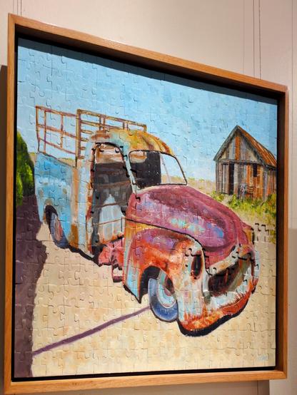 Bevan Henderson, "Missing Pieces". Painted over an old jigsaw puzzle with missing pieces, an old man sits alone on an old bench in front of a farm shed next to where his wife used to sit. He's staring at a rusted old ute.