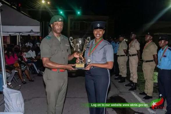 WPC Henry receives the trophy for Best Individual Drill from Kayode Sutton.jpg