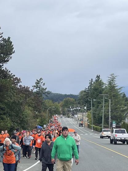 a line stretching down a long wide street
