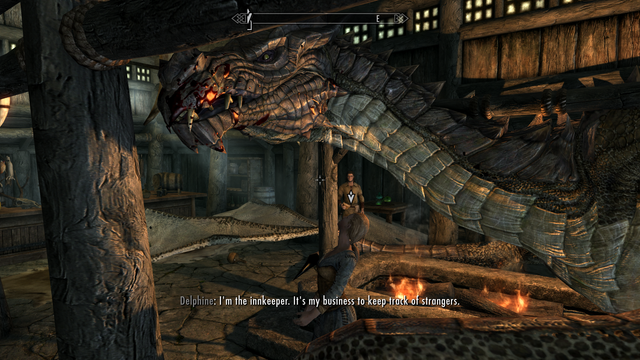 Modded Skyrim screenshot where the player has come to talk to Delphine and learn about the return of the dragons. This is spoiled by the fact that the player is a dragon and is taking up almost the entire floor space of the inn.  Delphine the wannabe dragonslayer is looking at him and saying "I'm the innkeeper. It's my business to keep track of strangers."

This was made with Play-As-A-Dragon SE