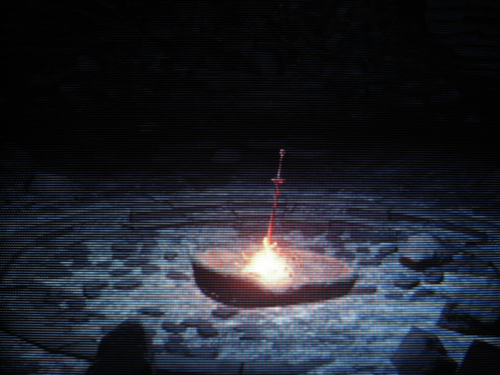 Across space and time, in the darkness of old, the first flame teeters on the edge of oblivion, flickering in agony.