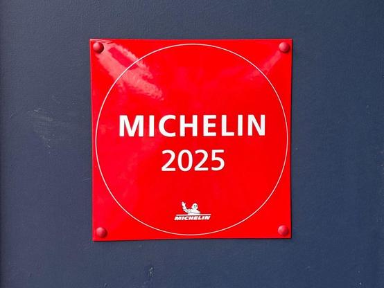Michelin's red "Recommended" plaque, outside Odd Duck in Kitchener.