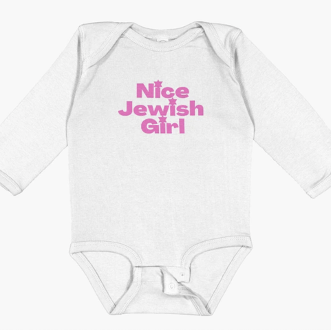 Nice Jewish Girl is shown in pink lettering on a baby onesie.