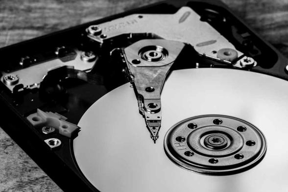 silver and black hard disk drive