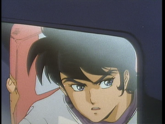 Ryo does his best Shatner impressination as he stares out of a plane window. There's something on the wing!