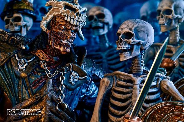 Evil Ash looks at one of the Skeletons in his Army.