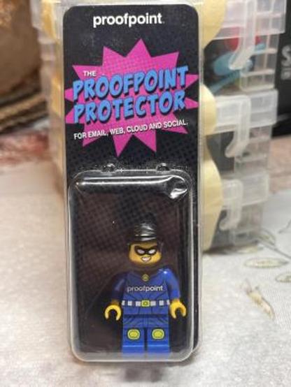 Blue outfit, some kind of black helmet.