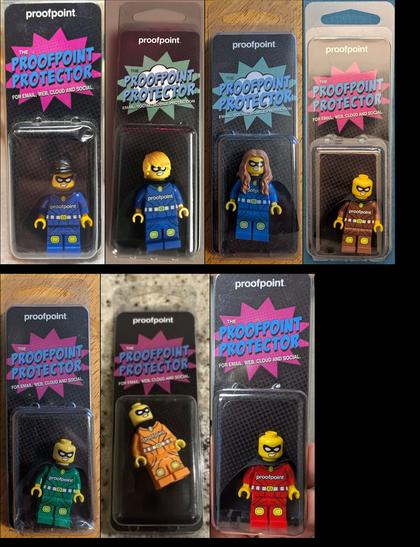 Contact sheet of Proofpoint promo LEGO minifigs in bubble packs. They all have a "superhero"-style body and black capes. Top of bubble pack says "PROOFPOINT PROTECTOR" in a Batman-style "POW!" spiky cloud, sometimes red or green background. Body colors are blue, brown, green, orange, and red. Headgear is hair (blond, long brown, black), or absent.