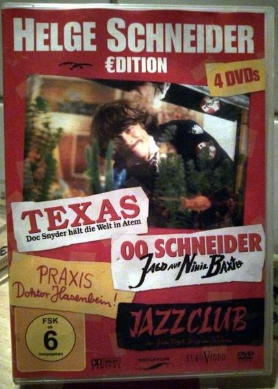 Eine DVD-Box mit vier Spielfilmen von und mit Helge Schneider: Texas, 00 Schneider, Praxis Doktor Hasenbein und Jazzclub