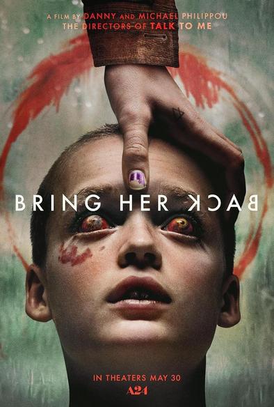 A poster for the film featuring a young boy with bulging red eyes, being held down by a woman’s hand.