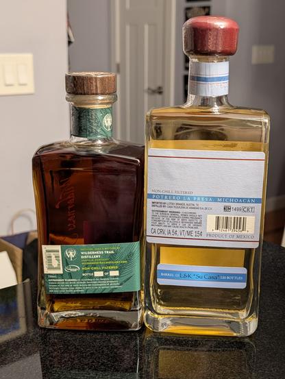Both bottles back
