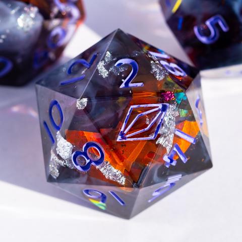 A D20 with purple swirls and orange reflective foil