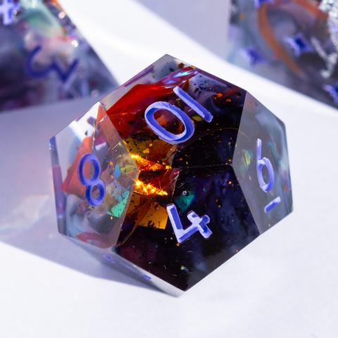 A D12 with purple swirls and orange reflective foil