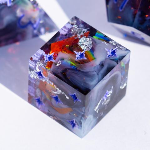 A D6 with purple swirls and orange reflective foil