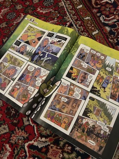 Magazine spread featuring 8 full comic pages