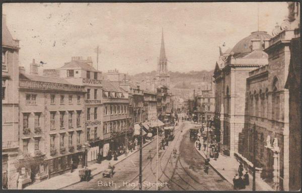 Printed sepia postcard showing a view of High Street at Bath in Somerset.

Published by F. Frith & Co Ltd, Reigate, Frith's Series, No 52996, photo registered in 1904.

Postally used on 5 December 1916 with double circle Bath cancellation on green halfpenny stamp and sent to Mrs F. Freeman, 52 Warwick Road, Clacton on Sea, Essex.

Good condition, with very slight corner bumps.