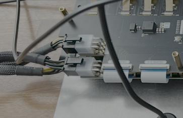 Close up of PCIe power connectors and cable connected to two SoundSlab boards