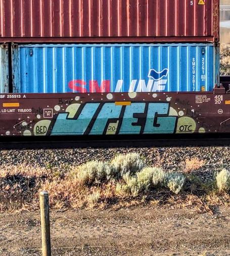 Train car with graffiti rolling through Kamloops BC Canada