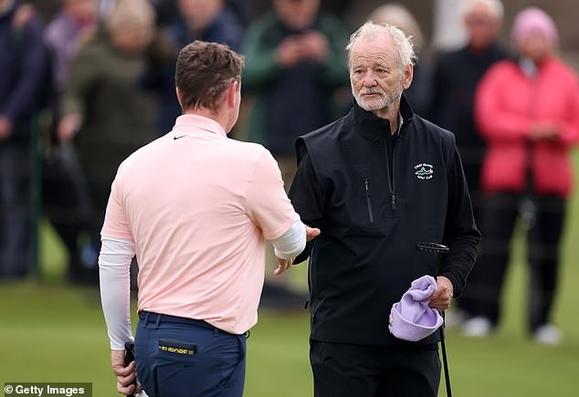 Billy Murray, 75, showed off his golfing skills as he teamed up with Scottish pro Robert MacIntyre at the famous Carnoustie Golf Links in Scotland on Thursday