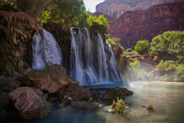 a backlit image of Upper Navajo Falls in Havasu Canyon 11 years ago