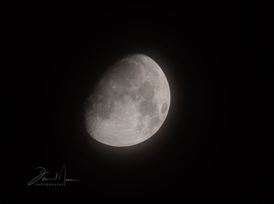 Hazy October Moon in its waning gibbous phase. About 75% illumination.