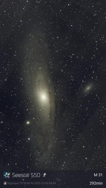A large vertical swirl of stars