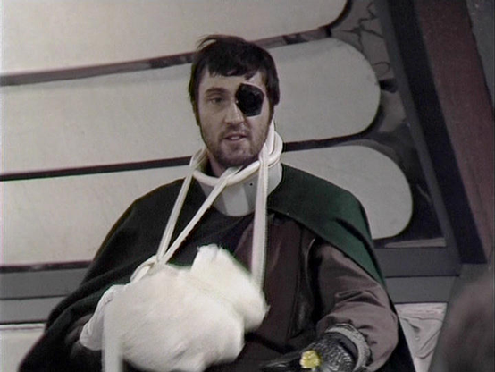 Travis played by Brian Croucher