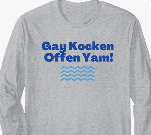 The funny Yiddish curse Hay Kocken Offen Yam is shown on a long sleeve T shirt.