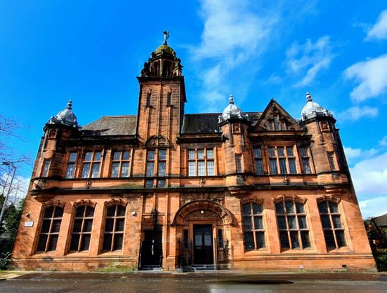 An ornate and imposing Edwardian former library building in Glasgow.