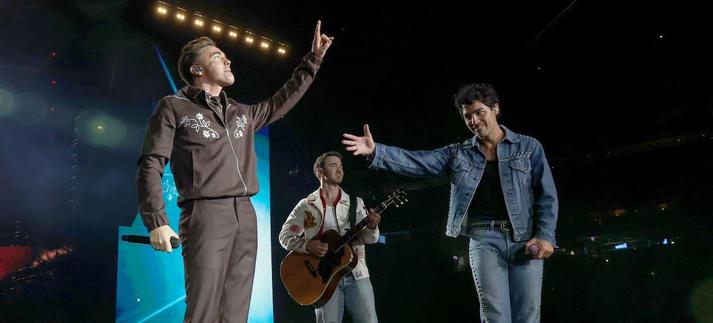 Jonas Brothers y Jesse McCarntney en el concierto de Nueva York / Kevin Mazur