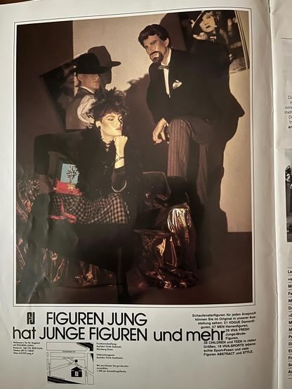 An ad for mannequins from a German mannequin catalogue or magazine from 1984, showing a male and female mannequins in formal 1920’s clothing.