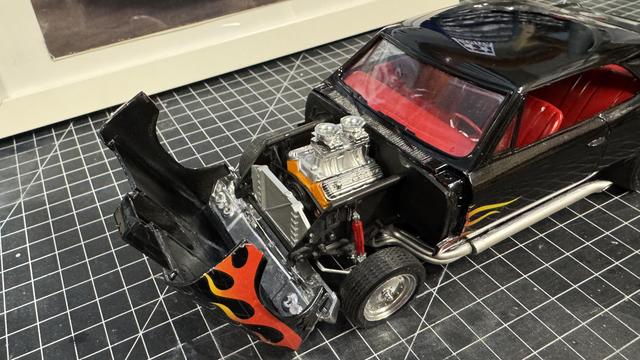 Finished model of a 1966 Malibu SS by Revell in 1:24 scale.