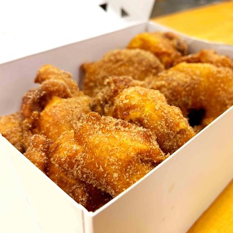 A box of ring-style apple fritters from St Jacobs Market's The Fritter Co.