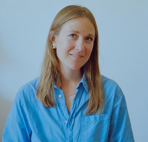 Director in a blue shirt