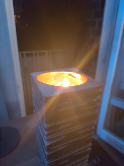 A solitary candle burning