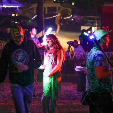 festival fans with colorful trippy toys