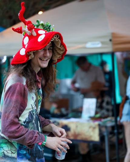 festival fan with shroom hat