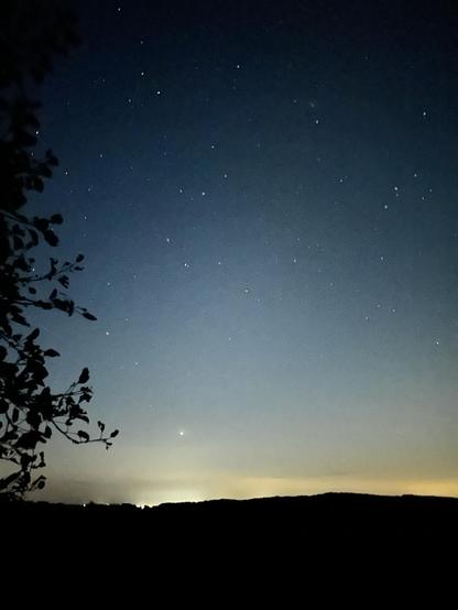 The camera brightened up the picture quite a bit. It’s too dark to my eyes to see anything except a few stars in the sky, the lights over the horizon of Alliston , and a yard light and barn light on the next line.