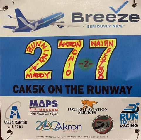 Color image of a runner's bib, 2025 CAK5K, Akron-Canton Airport, Summit and Stark Counties, Ohio, USA. Image shows a runner's bib ready for the run.