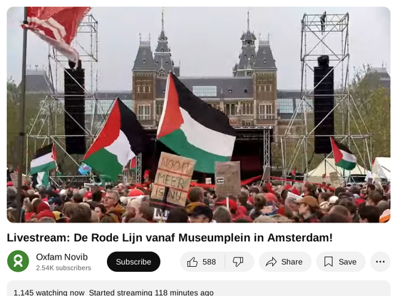 Museum square today in Amsterdam, lots of people at the protest. Palestinian flags and a sign with "Nooit meer is nu" which means "Never again is now". In the background a stage and the Rijks museum.

https://www.youtube.com/live/h0Ggpqn_0OY
