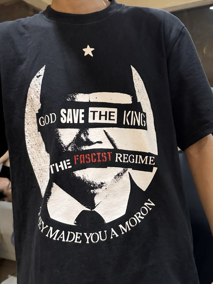 anarchist shirt with the defaced image of Prabowo Sobianto, the current Indonesian President