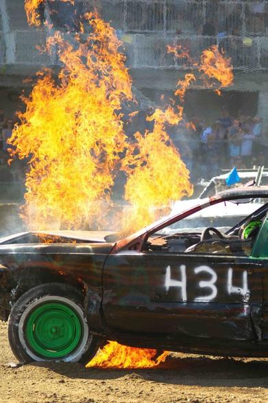 Photo of a derby car on fire in Kitchener, Waterloo.