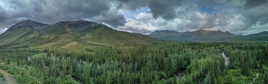 Panorama of the Tombstone valley and Oglivie Mountains with two hanging valleys on the left - Dempster Highway, Yukon Territory, Canada - Summer 2025.