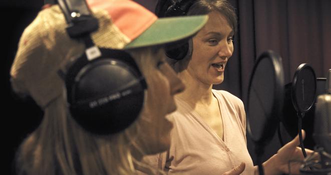 Iri and Nelly recording vocals.