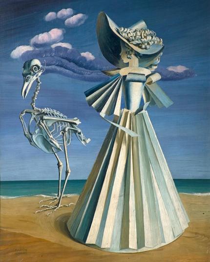 The skeleton of a large standing bird on the left. On the right, what might be a large cut out of a woman wearing a paper dress.