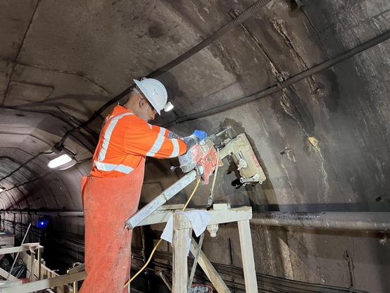 worker in metro tunnel
