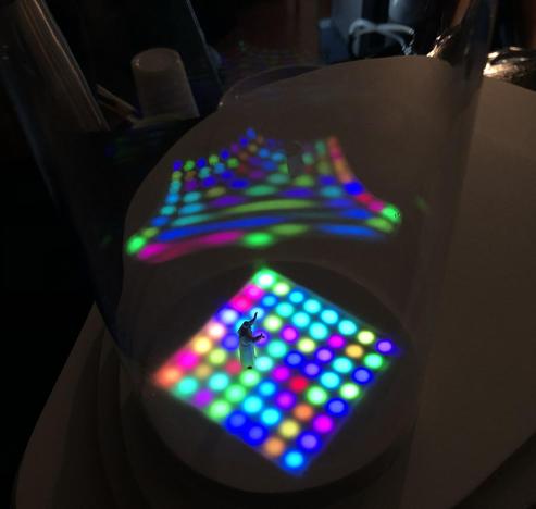 Pasi Rauhala's Disco Pope: A miniature Pope dancing on a colourful, flickering disco light floor. Placed in the Pikku-Vallila restaurant.